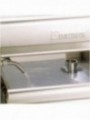 Gas steam grill with cooking grid in -O- on cabinet